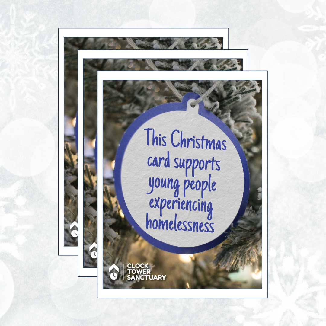 A 3-pack of Christmas cards, on which a paper bauble reads 'This Christmas card supports young people experiencing homelessness'